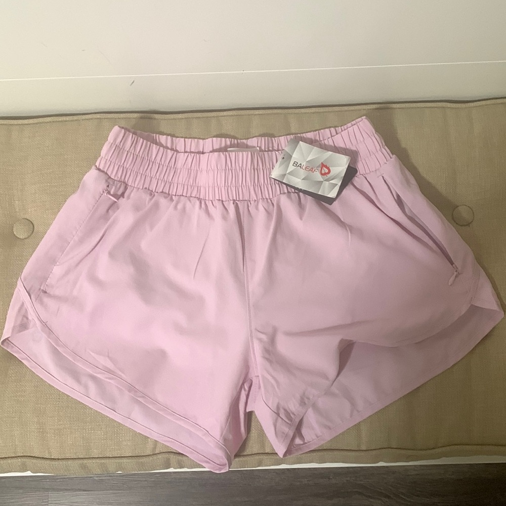 Baleaf athletic shorts. Women’s size small. New with tags.